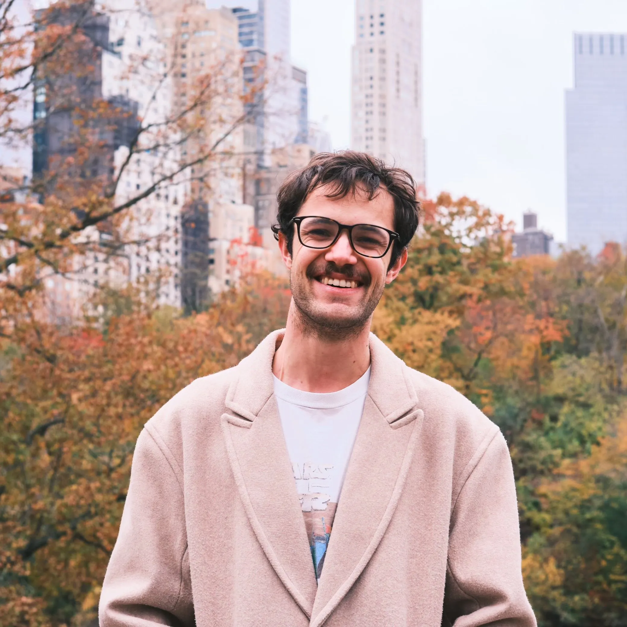 me in Central Park with the New York Skyline in the background